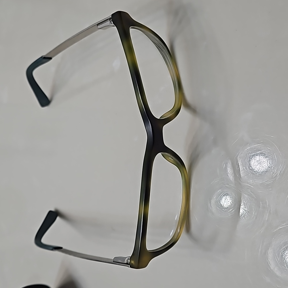 Tommy Hilfiger yellow and brown plastic frame glasses with case.
